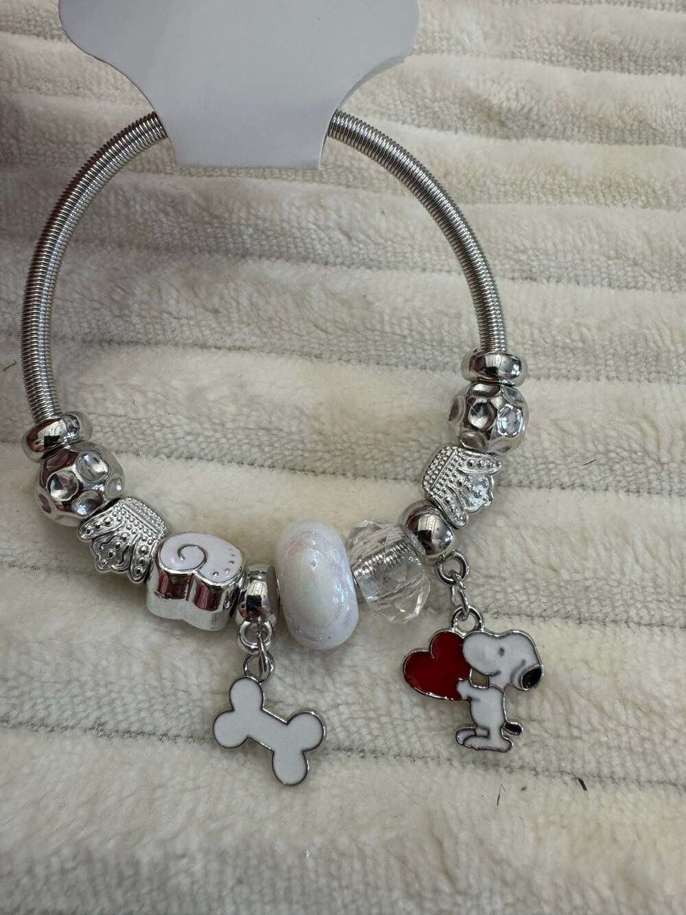 Peanuts Snoopy charm silver bracelet with bone and heart charms stretchy